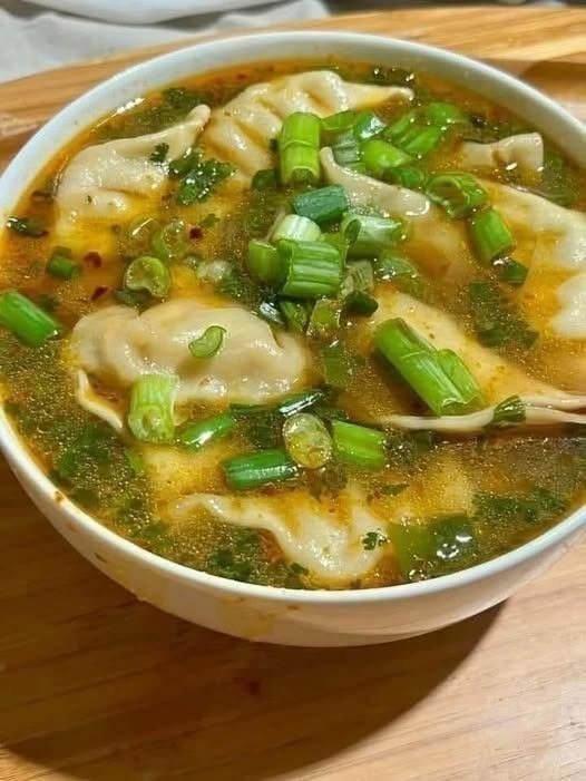 Homemade Dumpling Soup with Green Onions